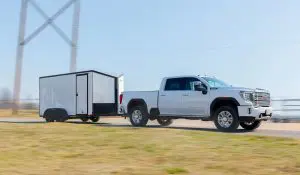 truck pulling a cross trailer